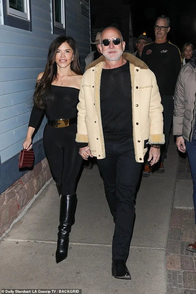 Lauren Sanchez didn039t seem to mind the cold as she stepped out in a semi-sheer ensemble in Aspen Colorado with her husband Jeff Bezos on Tuesday
